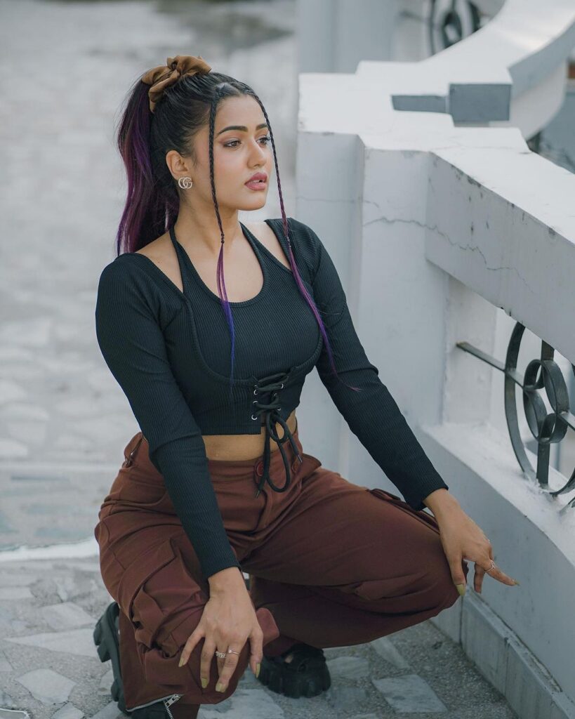 Garima Chaurasia in black top and brown cargo pants