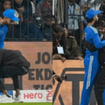 मैच के मध्य विराट कोहली को गले लगाने और उनके पैर छूने पर पुलिस ने लिया हिरासत में