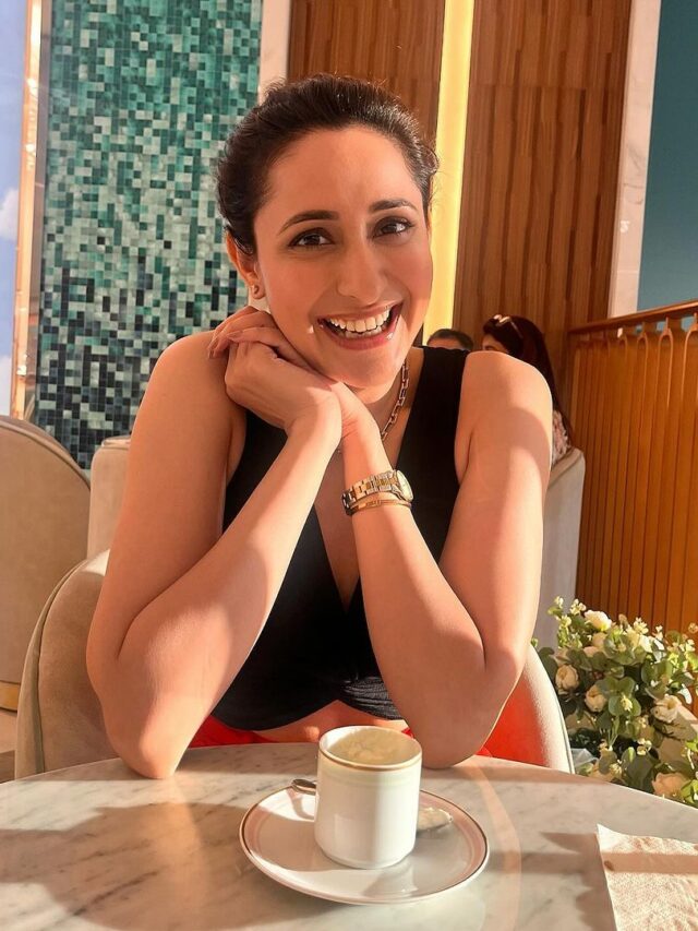 Sun-kissed Photoshoot of Pragya Jaiswal in black outfit with smiling face