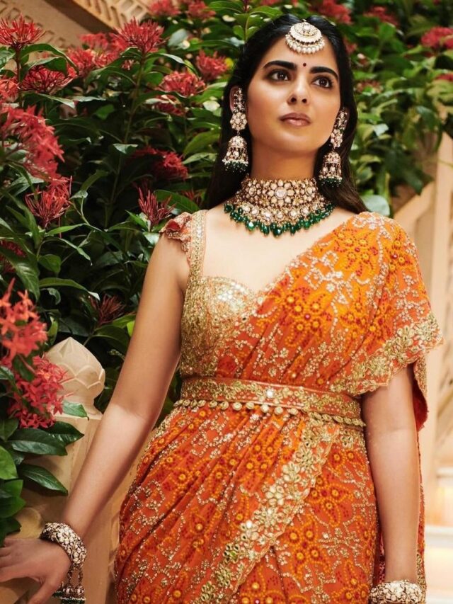 Glamorous Look Of Isha Ambani In Orange saree at the Mameru Ceremony of Anant Ambani & Radhika Merchant.