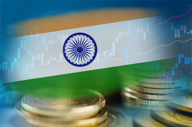Indian flag with coins and graphs.