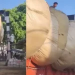 overloaded-truck-stuck-railway-crossing-viral-video-india-hindi