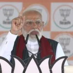 pm-modi-purulia-rally-tmc-syndicate-adivasi-land-jungle-raj-west-bengal-election-2026