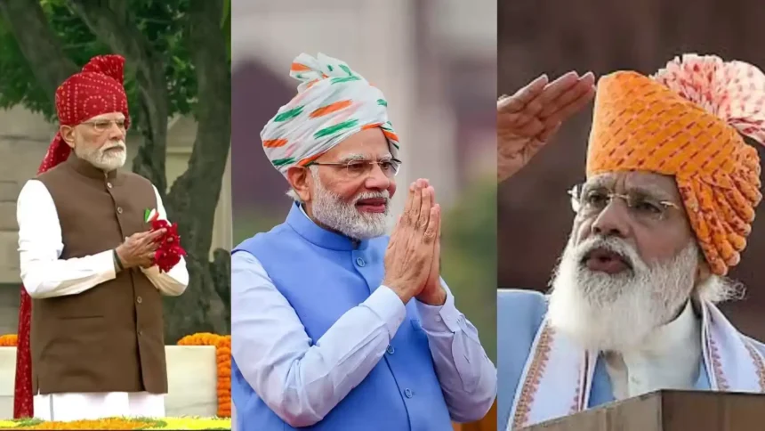 # PM Modi Pagdi 2026: लाल किले पर लाल पगड़ी में दिखे पीएम मोदी, 2014 से अब तक के खास पगड़ी लुक ## PM Modi Pagdi 2026: प्रधानमंत्री नरेंद्र मोदी के स्वतंत्रता दिवस भाषण के साथ हर साल उनके पहनावे और खास तौर पर उनकी पगड़ी की भी चर्चा होती है। 2014 में प्रधानमंत्री बनने के बाद से अब तक उनके साफे और पगड़ी के रंग, डिजाइन और स्टाइल में भारत की अलग-अलग लोक परंपराओं और सांस्कृतिक विविधताओं की झलक देखने को मिली है। 2026 में भी उन्होंने लाल किले की प्राचीर से देश को संबोधित करते हुए एक खास लाल टाई-एंड-डाई साफा पहना। भारत के 80वें स्वतंत्रता दिवस के मौके पर प्रधानमंत्री नरेंद्र मोदी ने लाल किले की प्राचीर से राष्ट्र को संबोधित किया। इस दौरान उनके भाषण के साथ उनका पारंपरिक लुक भी लोगों के बीच चर्चा का विषय बना। पीएम मोदी इस बार लाल रंग के आकर्षक टाई-एंड-डाई साफे में नजर आए। उन्होंने सफेद कुर्ता-पायजामा के साथ भूरे रंग की जैकेट पहनी थी। जैकेट की जेब पर तिरंगे रंग का पॉकेट स्क्वायर उनके लुक में देशभक्ति का रंग जोड़ रहा था। प्रधानमंत्री के स्वतंत्रता दिवस के परिधान में पगड़ी या साफा पिछले कई वर्षों से एक खास पहचान बन चुका है। हर साल उनके साफे का रंग, डिजाइन और बांधने का अंदाज अलग दिखाई देता है। कई मौकों पर इनमें राजस्थान, गुजरात और देश के अन्य हिस्सों की पारंपरिक लोक कलाओं की झलक भी नजर आई है। आइए तस्वीरों के जरिए जानते हैं 2014 से 2026 तक स्वतंत्रता दिवस पर पीएम मोदी के खास पगड़ी लुक के बारे में। ## 2026: लाल टाई-एंड-डाई साफे में नजर आए पीएम मोदी 2026 के स्वतंत्रता दिवस पर प्रधानमंत्री नरेंद्र मोदी ने लाल रंग का आकर्षक टाई-एंड-डाई साफा पहना। इसमें लाल, हरे और सफेद रंगों के खूबसूरत पैटर्न दिखाई दिए। साफे का लंबा सिरा पीछे की ओर लहराता हुआ नजर आया, जिसने उनके लुक को और खास बनाया। उन्होंने सफेद कुर्ता-पायजामा के साथ भूरे रंग की जैकेट पहनी थी। जैकेट की जेब पर तिरंगे रंग का पॉकेट स्क्वायर उनके पारंपरिक पहनावे में राष्ट्रीय भावना को दर्शाता नजर आया। **(Image Source: PTI)** ## 2025: गहरे भगवा रंग की शाही पगड़ी 2025 के स्वतंत्रता दिवस समारोह में पीएम मोदी गहरे भगवा रंग की पगड़ी में नजर आए। पगड़ी का रंग काफी प्रभावशाली था और इसमें तिरंगे रंगों का संयोजन भी देखने को मिला। भगवा साफे के साथ पारंपरिक पोशाक ने उनके लुक को अलग पहचान दी। स्वतंत्रता दिवस समारोह के दौरान पीएम मोदी की यह पगड़ी भी आकर्षण का केंद्र रही। **(Image Source: PTI)** ## 2024: भगवा-हरे रंग की पगड़ी 2024 में प्रधानमंत्री नरेंद्र मोदी ने भगवा और हरे रंग के संयोजन वाली पगड़ी पहनी थी। इसके साथ उन्होंने नीले रंग की सदरी पहनी, जिससे पगड़ी के रंग और अधिक उभरकर दिखाई दे रहे थे। उनका यह पारंपरिक अंदाज स्वतंत्रता दिवस के मौके पर खूब चर्चा में रहा। पगड़ी के रंगों का संयोजन पीएम मोदी के पिछले कई स्वतंत्रता दिवस लुक से अलग नजर आया। ## 2023: बहुरंगी राजस्थानी बांधनी पगड़ी 2023 में पीएम मोदी ने बहुरंगी राजस्थानी बांधनी प्रिंट वाली पगड़ी पहनी। इसमें लाल, पीले, हरे और बैंगनी जैसे चटख रंगों का इस्तेमाल दिखाई दिया। इसके साथ उन्होंने काले रंग की जैकेट पहनी थी। रंग-बिरंगी पगड़ी में राजस्थान की लोक कला और सांस्कृतिक विरासत की झलक नजर आई। पीएम मोदी का यह साफा उनके स्वतंत्रता दिवस के सबसे रंगीन लुक में से एक रहा। **(Image Source: PTI)** ## 2022: तिरंगे रंगों वाली पगड़ी आजादी का अमृत महोत्सव और हर घर तिरंगा अभियान के दौर में 2022 का स्वतंत्रता दिवस बेहद खास था। इस मौके पर पीएम मोदी की पगड़ी भी देशभक्ति के रंग में नजर आई। उन्होंने तिरंगे रंगों वाली पगड़ी पहनी और इसके साथ नीले रंग की जैकेट का चुनाव किया। पगड़ी को बांधने का अलग अंदाज भी लोगों के बीच चर्चा में रहा। **(Image Source: PTI)** ## 2021: केसरी और लाल रंगों का खास पैटर्न देश के 75वें स्वतंत्रता दिवस पर प्रधानमंत्री मोदी ने केसरी और लाल रंगों के पैटर्न वाली पगड़ी पहनी। इसके साथ उन्होंने हल्के नीले रंग की जैकेट पहनी थी। पगड़ी का डिजाइन और उसका लंबा ट्रेल उनके पूरे लुक को खास बना रहा था। इसमें पश्चिमी भारत की पारंपरिक शैली की झलक दिखाई दी। **(Image Source: PTI)** ## 2020: कोरोना काल में सादगी भरा लुक 2020 का स्वतंत्रता दिवस कोरोना महामारी के बीच मनाया गया था। उस समय पीएम मोदी का लुक सादगी और संदेश दोनों के लिहाज से खास रहा। उन्होंने केसरिया रंग की पगड़ी पहनी, जिस पर क्रीम रंग का प्रिंट दिखाई दे रहा था। इसके साथ क्रीम रंग की जैकेट पहनी गई थी। महामारी के दौर में उनके गमछे ने भी लोगों का ध्यान खींचा। **(Image Source: PTI)** ## 2019: बहुरंगी राजस्थानी पगड़ी 2019 में लगातार दूसरी बार प्रधानमंत्री बनने के बाद लाल किले से स्वतंत्रता दिवस संबोधन के दौरान नरेंद्र मोदी ने बहुरंगी राजस्थानी पगड़ी पहनी। इसमें लाल, पीले और हरे रंगों के साथ खूबसूरत कढ़ाई और डिजाइन नजर आए। रंगीन साफे ने उनके पारंपरिक अंदाज को और आकर्षक बनाया। **(Image Source: PTI)** ## 2018: भगवा पगड़ी ने खींचा ध्यान 2018 के स्वतंत्रता दिवस पर पीएम मोदी भगवा रंग की पगड़ी में नजर आए। पगड़ी का रंग और पारंपरिक शैली उनके पहनावे की खास पहचान बनी। भगवा रंग भारतीय परंपरा और सांस्कृतिक प्रतीकों में खास महत्व रखता है। पीएम मोदी के इस लुक ने स्वतंत्रता दिवस समारोह में उनकी पारंपरिक शैली को अलग पहचान दी। **(Image Source: PTI)** ## 2017: लाल पगड़ी और क्रीम जैकेट का कॉम्बिनेशन 2017 में प्रधानमंत्री नरेंद्र मोदी ने लाल रंग की आकर्षक पगड़ी पहनी थी। इसके साथ उन्होंने क्रीम रंग की जैकेट पहनी। लाल पगड़ी और हल्के रंग की जैकेट का कॉम्बिनेशन काफी प्रभावशाली नजर आया। इस साल का साफा भी उनके पारंपरिक स्वतंत्रता दिवस लुक में खास रहा। ## 2016: गुलाबी-पीली बांधनी शैली 2016 में पीएम मोदी ने गुलाबी और पीले रंगों वाली टाई-एंड-डाई यानी बांधनी शैली की पगड़ी पहनी। इसमें कई रंगों का सुंदर मिश्रण और पारंपरिक डिजाइन दिखाई दिया। राजस्थान की लोक कला से प्रेरित यह साफा उस साल स्वतंत्रता दिवस समारोह के प्रमुख आकर्षणों में शामिल रहा। **(Image Source: PTI)** ## 2015: क्रिस-क्रॉस डिजाइन वाली राजस्थानी पगड़ी 2015 के स्वतंत्रता दिवस पर प्रधानमंत्री ने क्रिस-क्रॉस डिजाइन वाली राजस्थानी शैली की पगड़ी चुनी। इसमें पीले रंग के साथ लाल और गहरे हरे रंग की धारियां दिखाई देती थीं। उन्होंने खादी सिल्क कुर्ते के साथ नेहरू जैकेट पहनी थी। रंगीन पगड़ी के साथ उनका यह पारंपरिक पहनावा काफी आकर्षक नजर आया। **(Image Source: PTI)** ## 2014: प्रधानमंत्री के रूप में पहला पगड़ी लुक 2014 में प्रधानमंत्री नरेंद्र मोदी ने अपने पहले स्वतंत्रता दिवस समारोह में पारंपरिक राजस्थानी बंधेज पगड़ी पहनी थी। यह लाल और हरे रंग के आकर्षक संयोजन वाली पगड़ी थी। इसका लंबा सिरा पीछे की ओर लटक रहा था और पगड़ी ने उनके पहले स्वतंत्रता दिवस लुक को खास पहचान दी। 2014 के इसी अंदाज के बाद स्वतंत्रता दिवस पर पीएम मोदी की पगड़ी हर साल लोगों की नजरों में रहने लगी। ## हर साल अलग पगड़ी, दिखती है भारत की सांस्कृतिक विविधता 2014 से 2026 तक प्रधानमंत्री नरेंद्र मोदी के स्वतंत्रता दिवस के पगड़ी लुक पर नजर डालें तो इसमें रंगों और डिजाइनों की काफी विविधता दिखाई देती है। कहीं राजस्थानी बांधनी और बंधेज की झलक मिलती है तो कहीं तिरंगे रंगों का इस्तेमाल नजर आता है। यही वजह है कि स्वतंत्रता दिवस पर पीएम मोदी का पहनावा उनके भाषण के साथ सोशल मीडिया और खबरों में भी चर्चा का विषय बन जाता है। 2026 में लाल टाई-एंड-डाई साफे के साथ उनका लुक भी इसी परंपरा का हिस्सा रहा। pm-modi-pagdi-2026-2014-se-2026-tak-pagdi-look