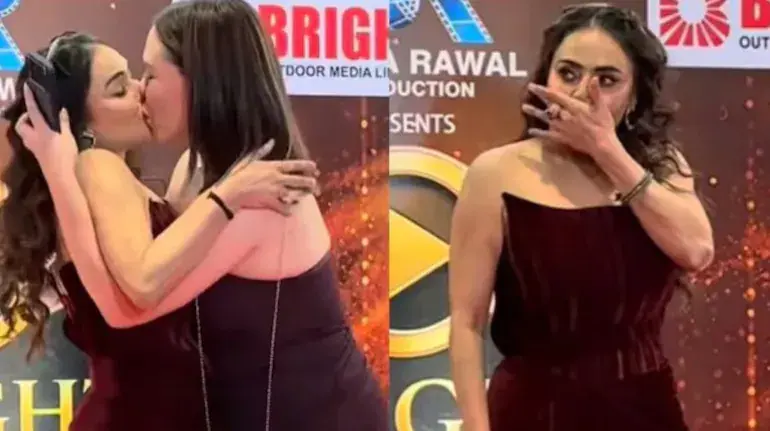 nikita-rawal-female-fan-kiss-red-carpet-video-viral